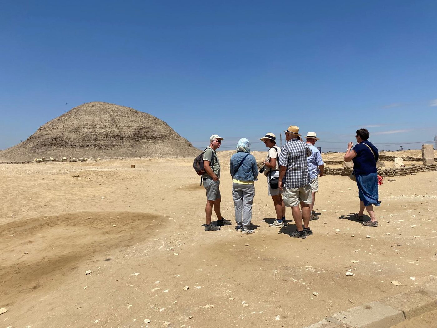 Group facing the pyramid of Saqqara